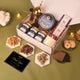 Open Shaan-e-Noor Hamper displaying butter cookies, chocolates, dry fruits, and a thank you card, ideal for gifting during festive occasions.