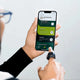 Zikr Ring Flex Pro syncing with mobile app for tasbih customization, prayer reminders, and ring tracking features.
