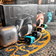 iQIBLA fitness tracker with charging case on a textured surface