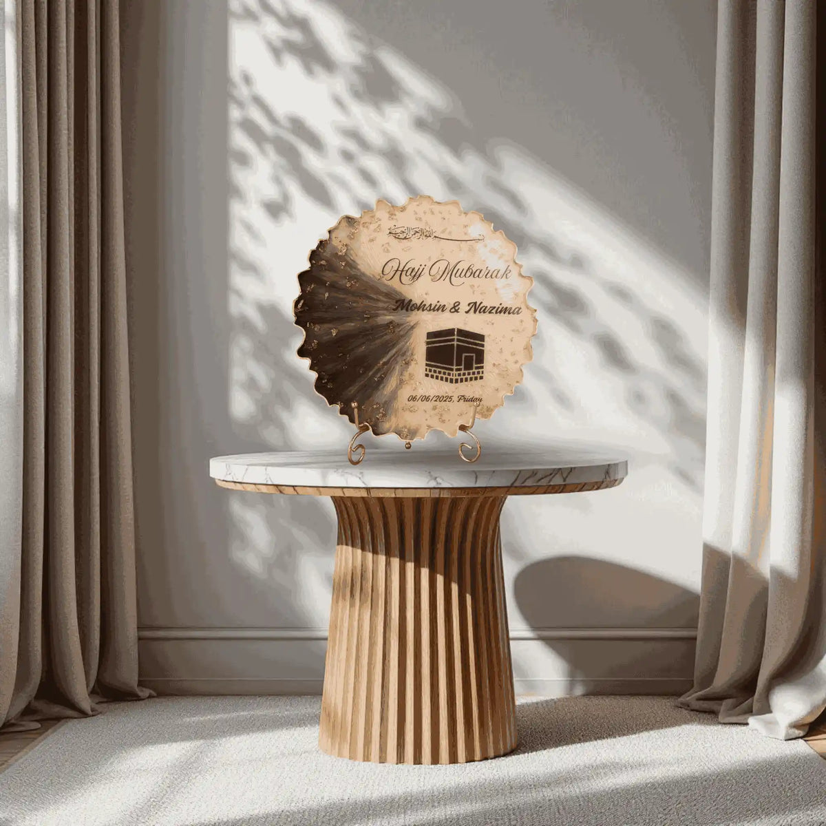 Decorative wooden plaque on a marble table with curtains in the background