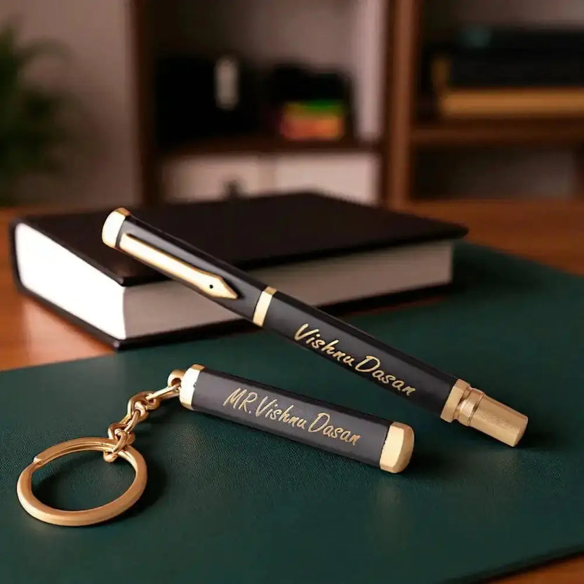Personalised Pen and Key Chain - Gift Set | Custom Name in black and gold finish displayed on a desk with books, ideal for office gifting. Main image
