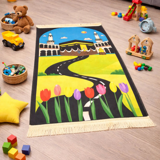 Kids Prayer Mat - Personalized Mat | Janamaz for Kids with Kaaba and tulip print, surrounded by toys, ideal for Ramadan or Eid gifting.