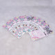 A fanned-out stack of pink Eidi cards for girls featuring a cartoon girl in a hijab, pastel stars, lanterns, and "Eid Mubarak" text.