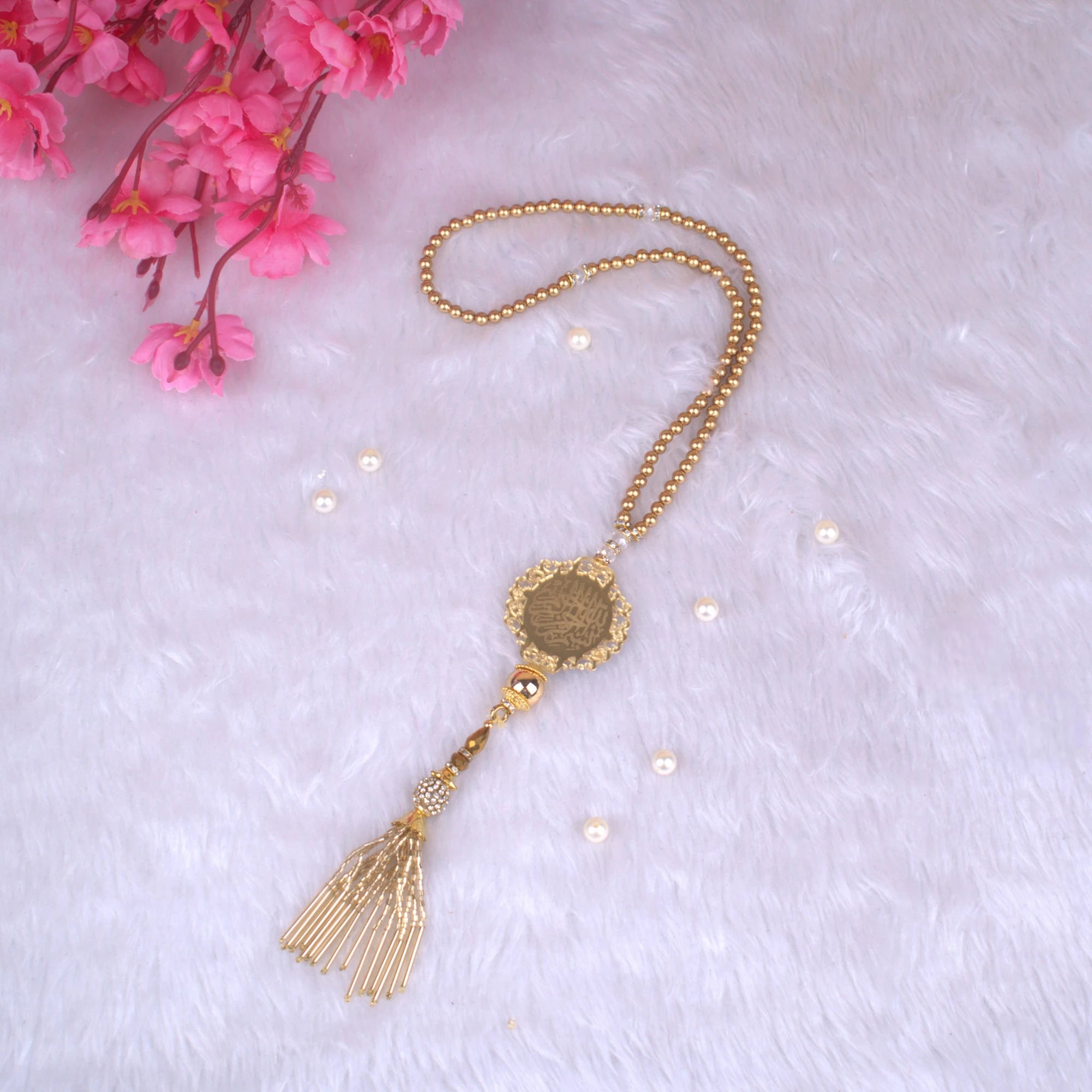 Golden Pearl Tasbeeh with 100 crystal beads and gold tassel, ideal for Islamic wedding favors and religious gifting. Main image