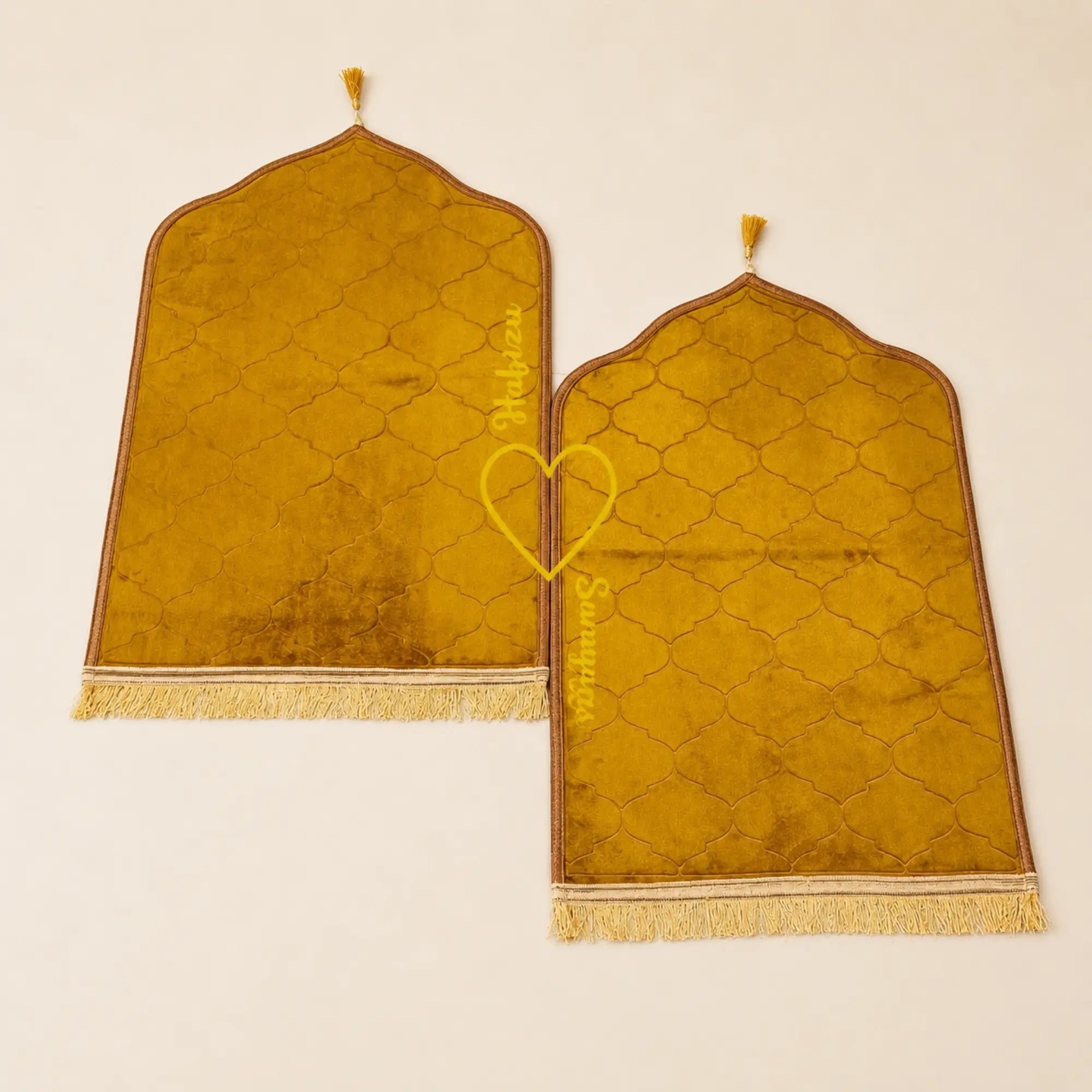 Golden velvet prayer mats with arched design and tassels, part of the Golden Floral Pearl Bridal Sawab-e-Jariya Hamper wedding gift set. Main image