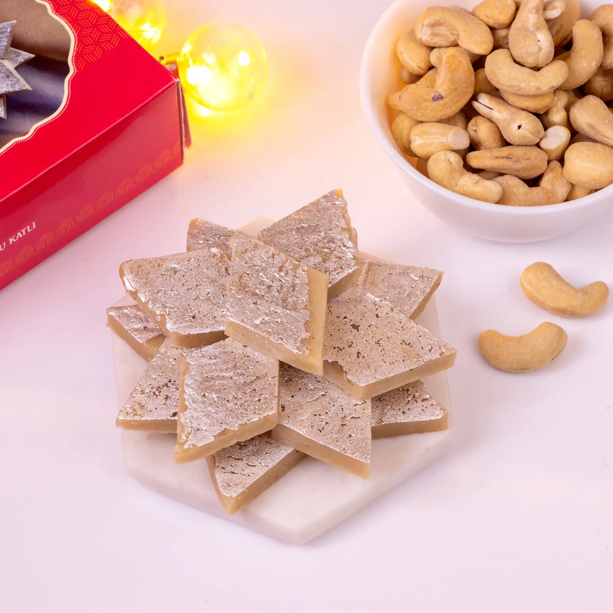 Premium Kaju Katli sweets from the Golden Indulgence Hamper, perfect for Islamic gifting and festive sharing.