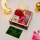 Golden Ramadan Mubarak Hamper with red hijab, Islamic book, sweets, and greeting card, ideal for luxury Ramadan gift delivery.