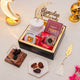 Golden Ramadan Mubarak Hamper - Ramadan Gift Hamper with white hijab, dates, Islamic book, and premium treats for festive gifting.