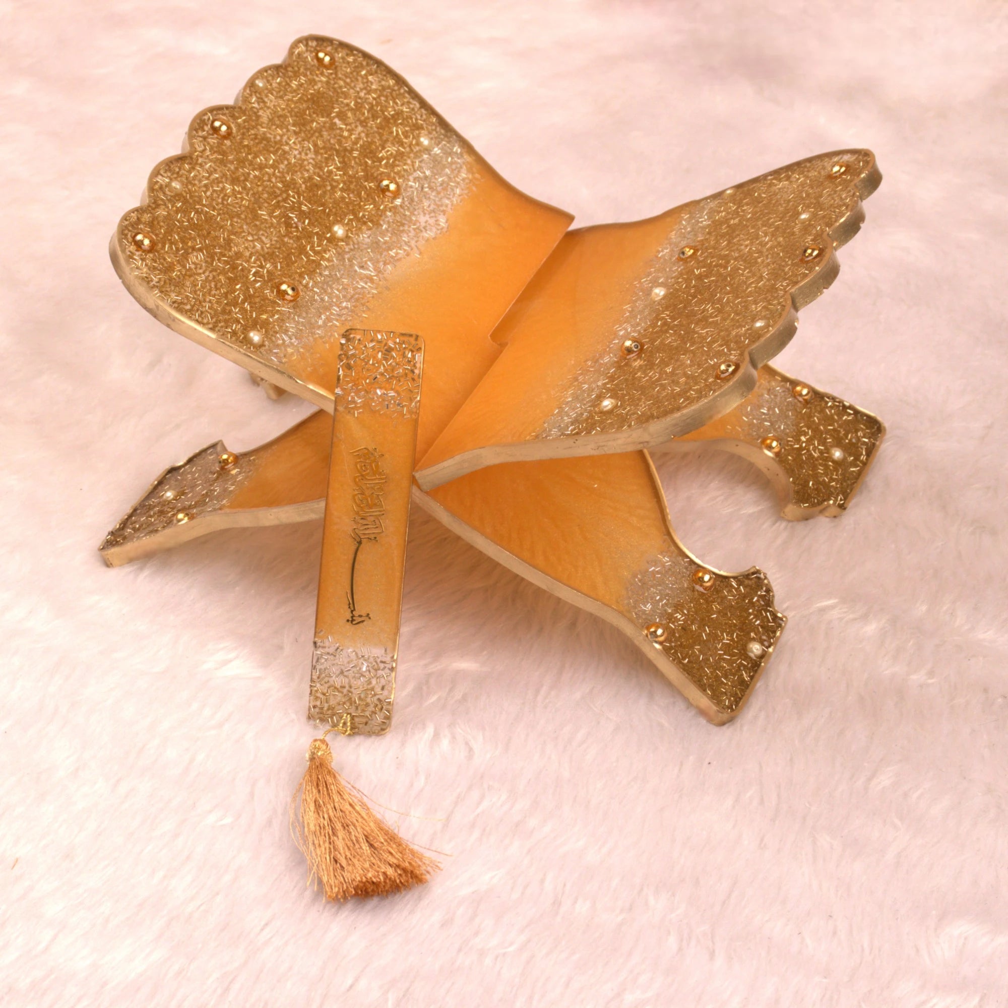 Golden glitter Rehal and matching bookmark from the Golden Sequence Rehal Hamper. Decorative and functional for Quran recitation. Main image