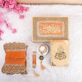Premium Golden Sequence Rehal Hamper featuring Quran, glitter Rehal, and tasbeeh, displayed elegantly with floral decor. Perfect for gifting occasions.
