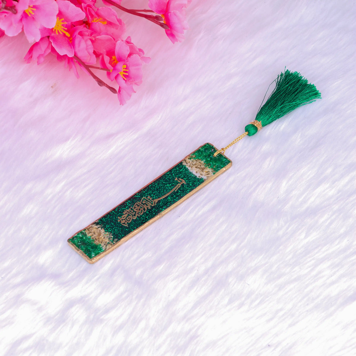 Green Islamic personalized bookmark with gold glitter and green tassel, perfect for gifting or as a wedding favor with elegant calligraphy.