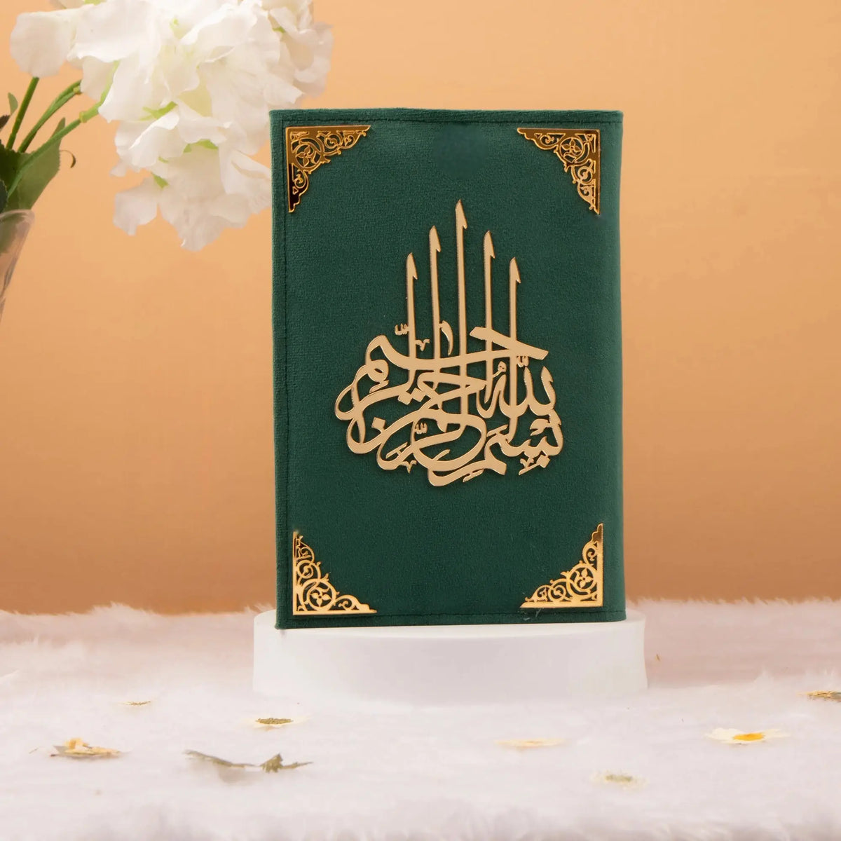 Velvet-covered green Quran with gold Islamic calligraphy from the Green Flakes Sawab-E-Jariya Hamper, perfect for gifting.