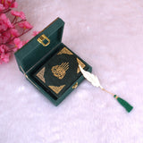 Velvet Quran Gift Set - Green Flakes Mini Tilawat-Quran in a green velvet box with gold detailing and feather bookmark. Ideal religious gift item.