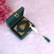 Velvet Quran Gift Set - Green Flakes Mini Tilawat-Quran in a green velvet box with gold detailing and feather bookmark. Ideal religious gift item.
