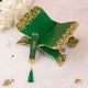 Green and gold Quran Rehal from the Green Flakes Sawab-E-Jariya Hamper, perfect for ceremonial and religious use.