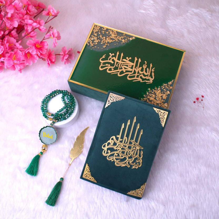 Tilawat Quran Gift Set featuring green velvet Quran, personalized Tasbeeh, and gold feather bookmark in a luxury green and gold box. Main image