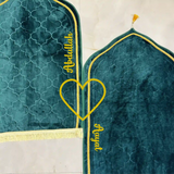 Personalized Couple Prayer Mat Duo featuring Green Dome shape and yellow heart, names 'Abdullah' and 'Ayat' stitched, perfect for gifting.