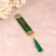Close-up of green Islamic bookmark with tassel from the Sawab-E-Jariya Hamper, ideal for Quran reading and spiritual gifts.