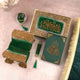 Decorative items with green and gold colors on a textured surface
