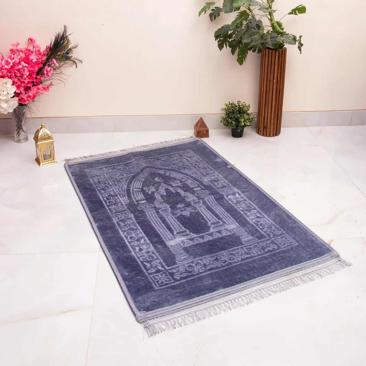 Grey Rectangle Janamaz - Custom Prayer Rug with plush velvet texture, ideal for Ramadan and Eid gifting, placed in a serene indoor setting.