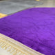 Detailed view of purple prayer mat from Couple Janamaz Set, highlighting plush texture and gold fringe for a luxurious prayer experience.