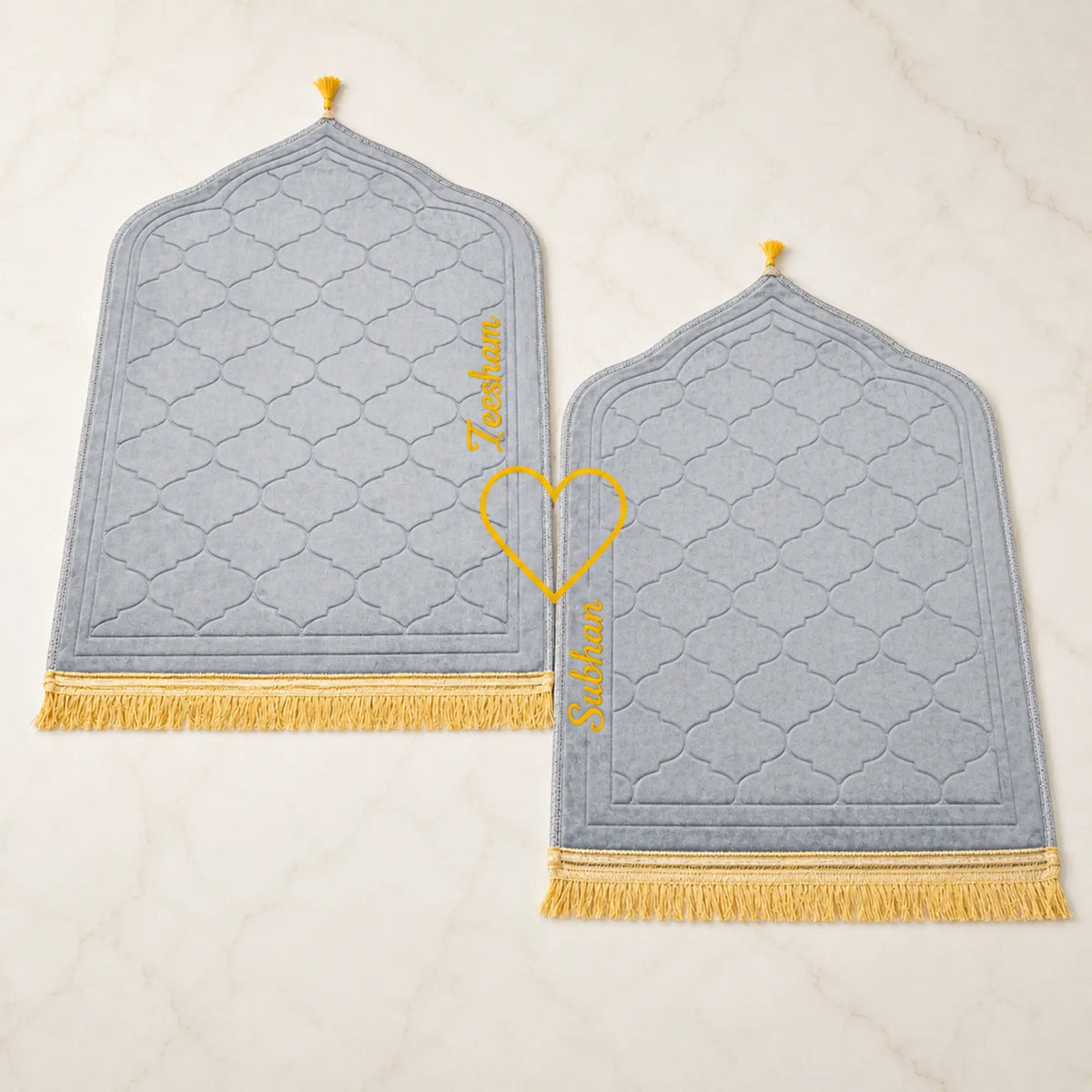 Velvet prayer mats in grey and navy with gold tassels labeled 'Zulekha' and 'Saleha' from the Bridal Sawab-e-Jariya Gift Set.