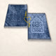 Two grey prayer mats with intricate patterns labeled 'Waleem' and 'Nikah' from the Bridal Sawab-e-Jariya Hamper for couples.