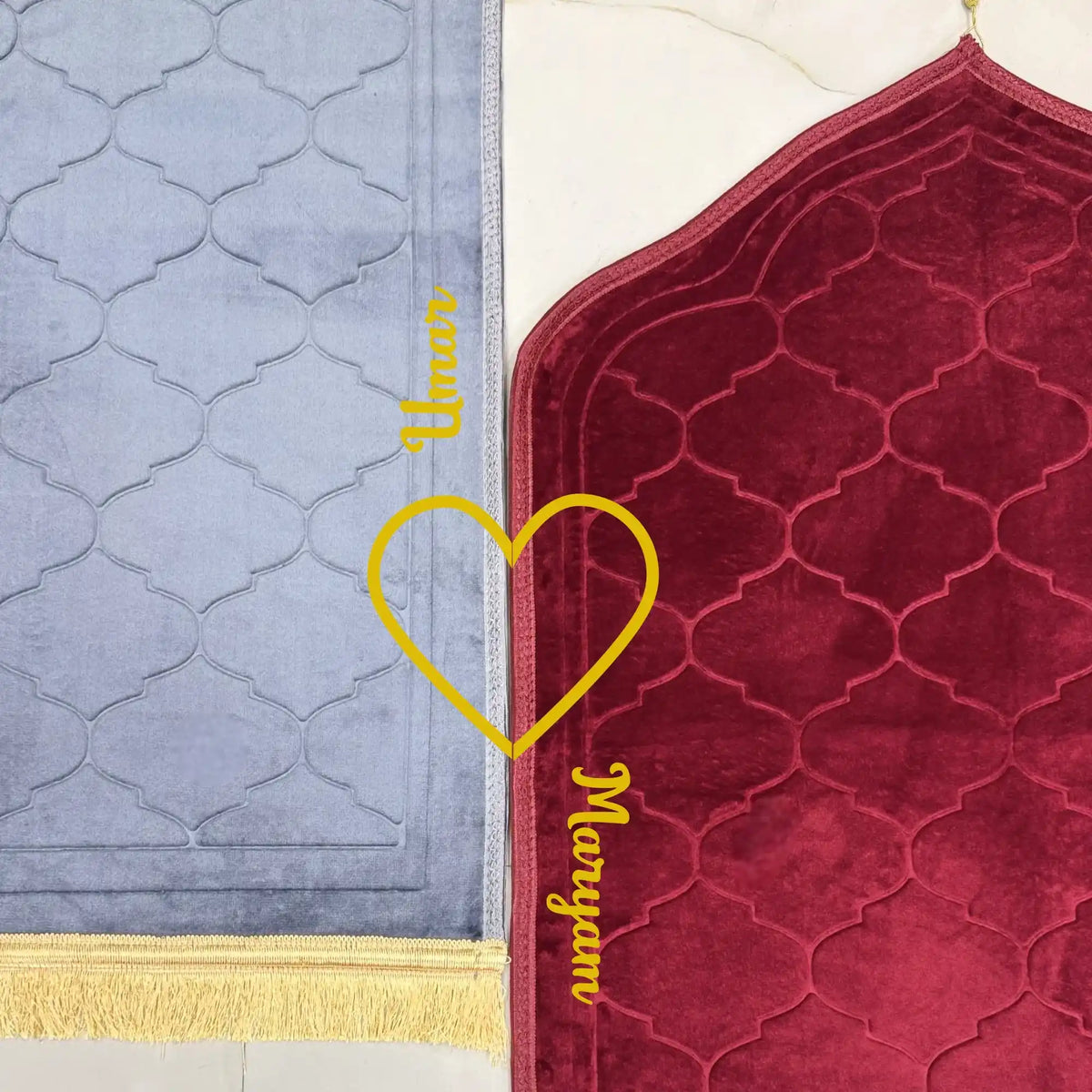Two prayer rugs, one gray and one red, with 'Umar' branding on a white background.