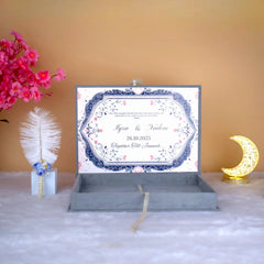 Interior of Grey Nikah Nama Hamper showing custom printed Nikah Nama with floral design, part of luxury wedding ceremony supplies.