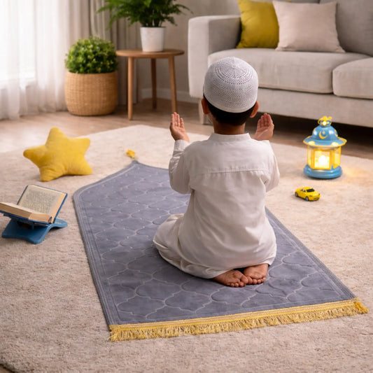 Gray Kids Dome Janamaz - Kids Dome Prayer Rug shown with a child in prayer, ideal for ages 3 to 10. Soft, dome-shaped mat in a cozy home setting.