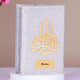 Gujarati Quran Bling Cover in silver with personalized nameplate and golden Islamic calligraphy. Elegant Islamic gift from The Bling Collection.