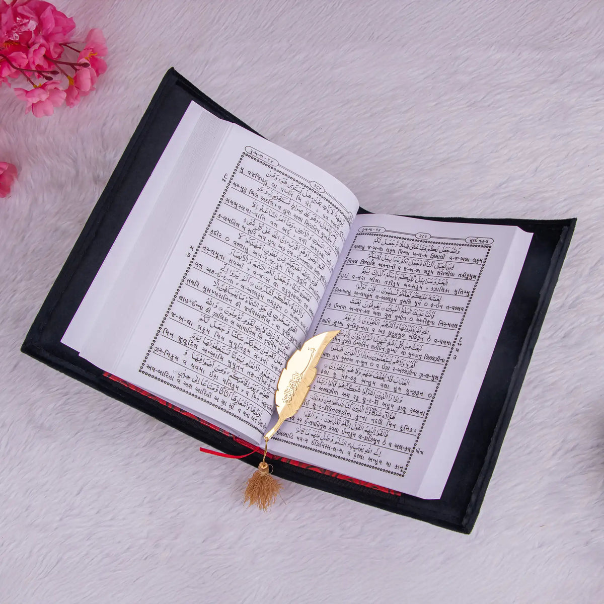 Open Quran with Hindi translation and gold feather bookmark. Part of the Sawab-e-Jariya Bridal Gift set for multilingual readers.