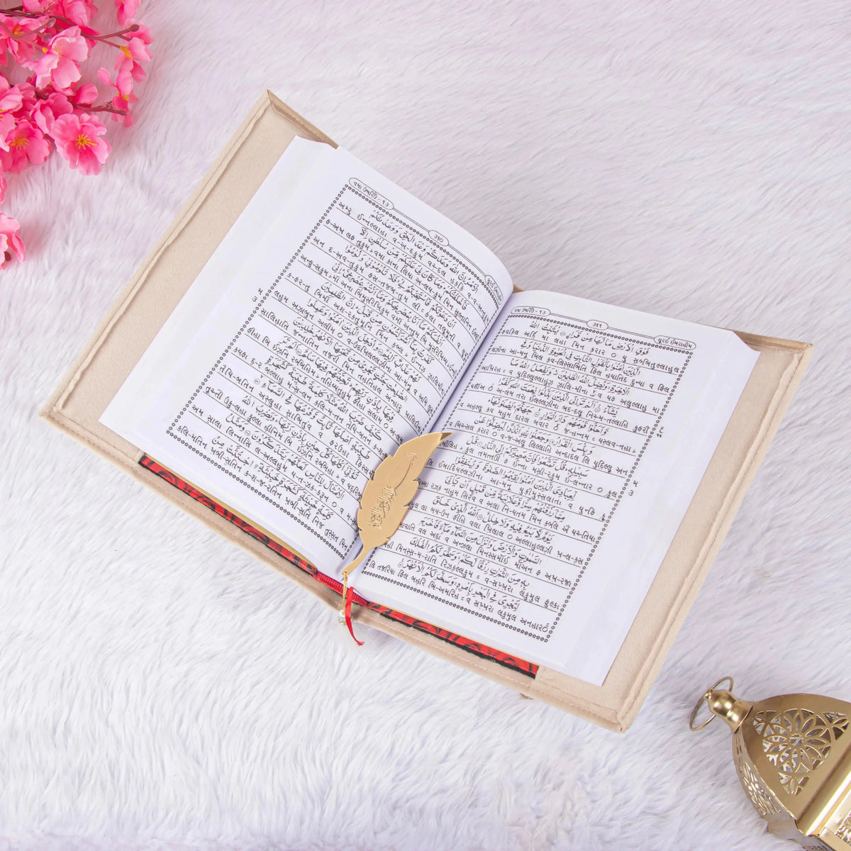 Quran with black Urdu script and red ribbon, part of the Bridal Gift Hamper - Sawab-e-Jariya for religious wedding gifts.