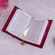Maroon Sequence Rehal Hamper - Luxury Quran Gift Set featuring an open velvet Quran with gold feather bookmark on a white fur background.