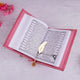 Pink Quran open to Urdu translation with golden feather bookmark, included in the Butterfly Quran Gift Set - Pink Butterfly Sawab-e-Jariya.
