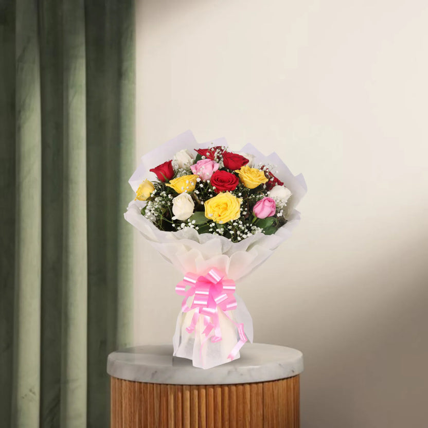 Modern Romance - Modern Bouquet with Mixed Roses featuring red, white, pink, and yellow premium roses wrapped in white paper with a pink bow. Main image