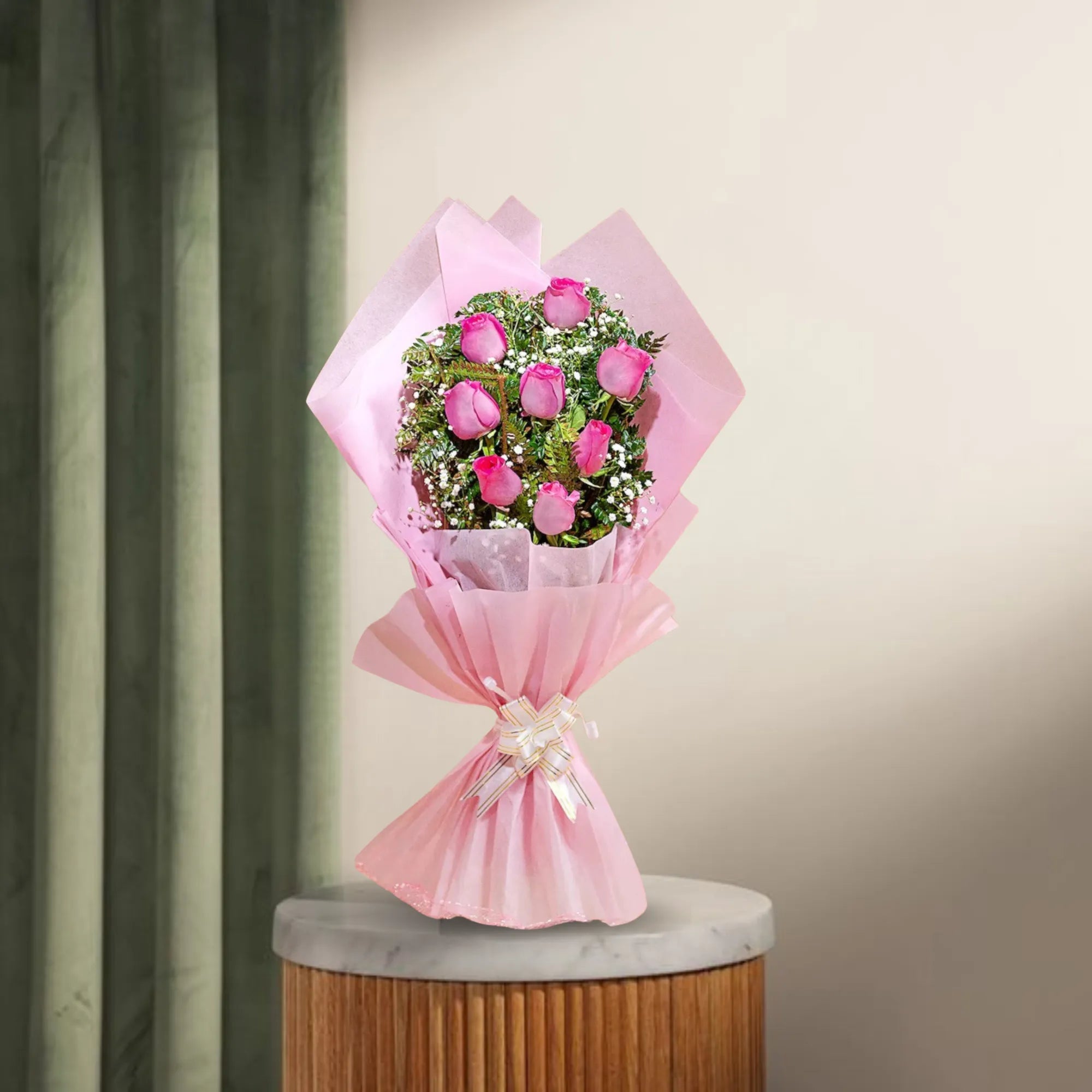 8 Pink Roses Bouquet wrapped in pastel pink paper with baby's breath, ideal for graceful gifting. Order now for same-day delivery. Main image