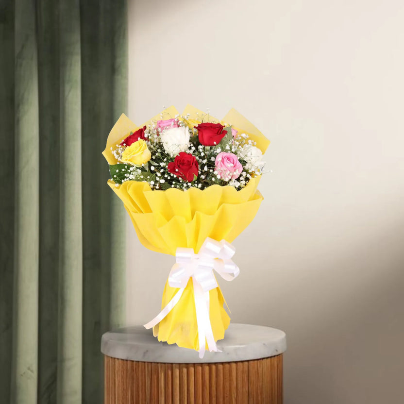 Elegant Roses Bunch - Roses Gift Bouquet with vibrant red, pink, yellow, and white roses wrapped in yellow paper, ideal for home decor or gifting. Main image