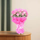 Exotic Pink Roses Bouquet with 8 pink roses, white fillers, and pink ribbon wrap. Ideal for expressing affection or gifting on special occasions.