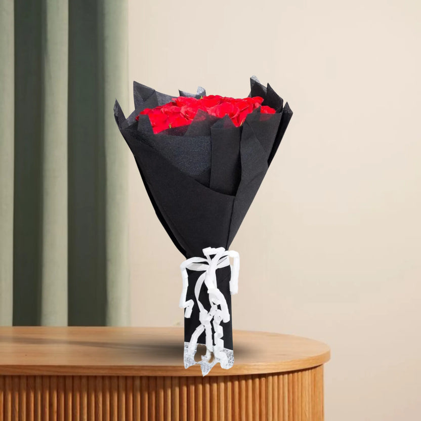 Red Roses Bouquet - Express Love | 20 Stems Flowers wrapped in black paper with white ribbon, displayed on a wooden table for romantic gifting. Main image