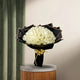 Peaceful White Roses Bouquet arranged in packaging, close-up
