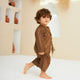 Toddler walking in Brown Thobe Romper Boys - Baby Boys Thobe Romper, ideal for festive wear with breathable material and cultural design.