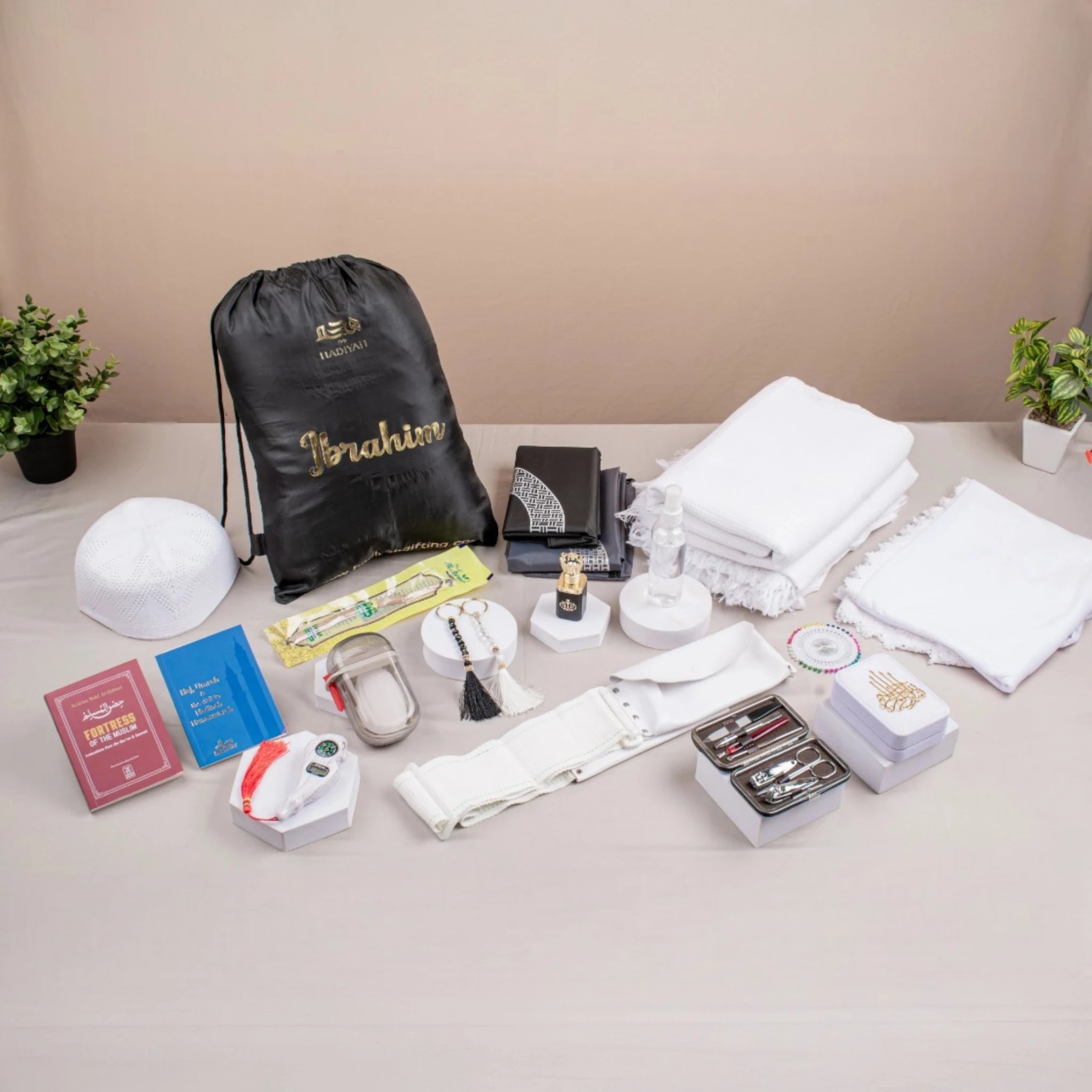 Luxe Hajj Umrah Set - Ihram, Hijab, Travel Kit for couples featuring prayer essentials, grooming tools, and personalized drawstring bag. Main image