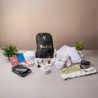 Hajj-e-Mabroor Luxe Couple Set with Ihram, hijab, prayer mat, tasbeeh, and travel accessories for a complete pilgrimage experience.