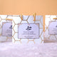Close-up of Barakah Hajj Return Gift Hamper with elegant white and gold packaging. Personalized Hajj gift for friends and family.