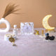 Hajj Gift Hamper Pack by Barakah featuring Zamzam water, dates, tasbih, and Islamic decor. Unique return gift for Hajj & Umrah celebrations.