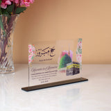 Elegant Kaaba Design Acrylic Plaque for Hajj & Umrah gifts, featuring custom names, floral accents, and spiritual blessings.