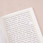 Book page with text on a beige background