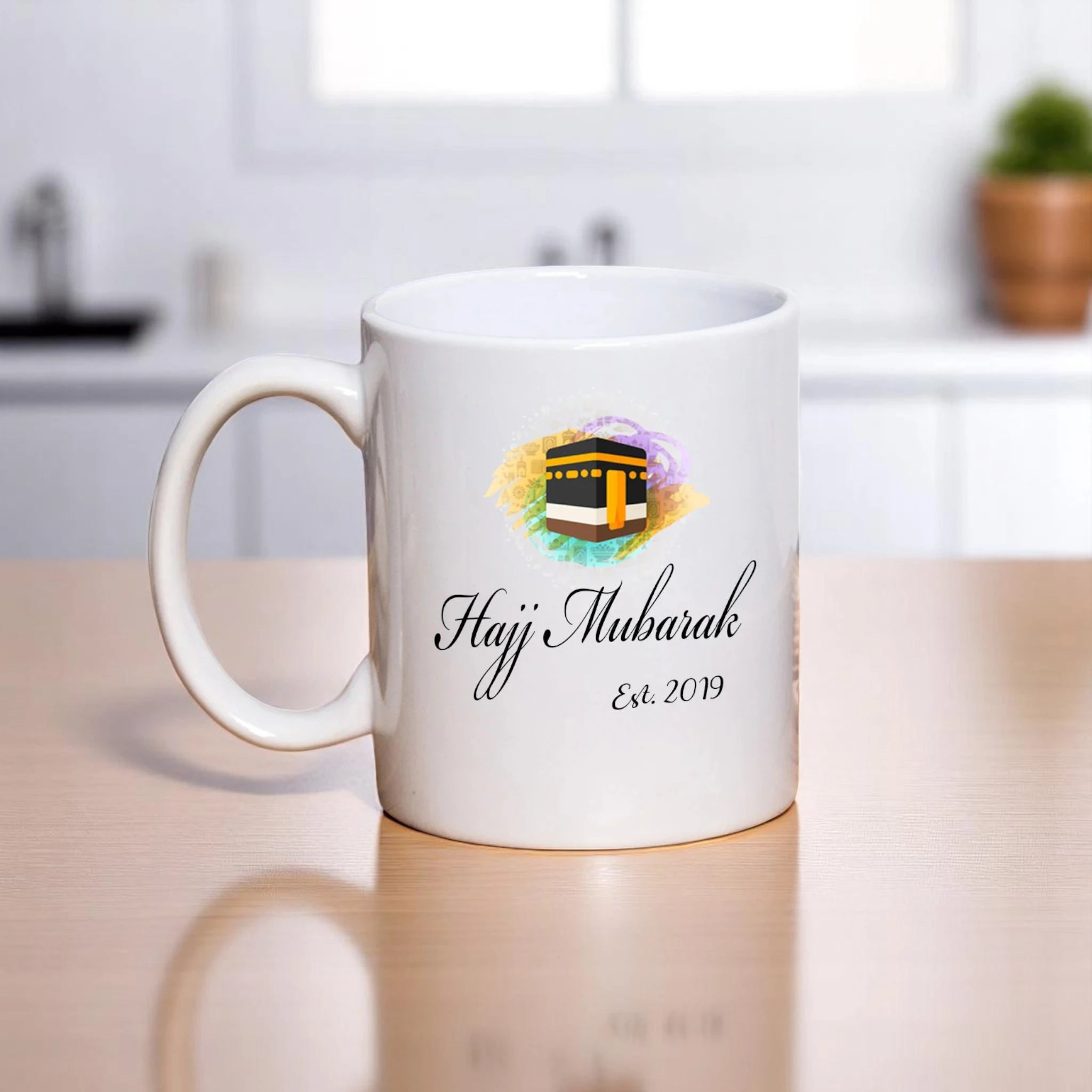 Personalized Hajj Mubarak Mug - Welcome Back design with Kaaba illustration and 'Hajj Mubarak Est. 2019' text on white ceramic, 350ml mug. Main image