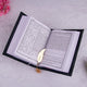 Open Quran with Punjabi translation and gold feather bookmark. Included in the Sawab-e-Jariya Bridal Gift set for inclusive spiritual gifts.